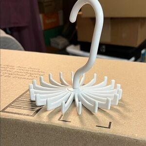 Elegant White Rotating Hook for Accessories